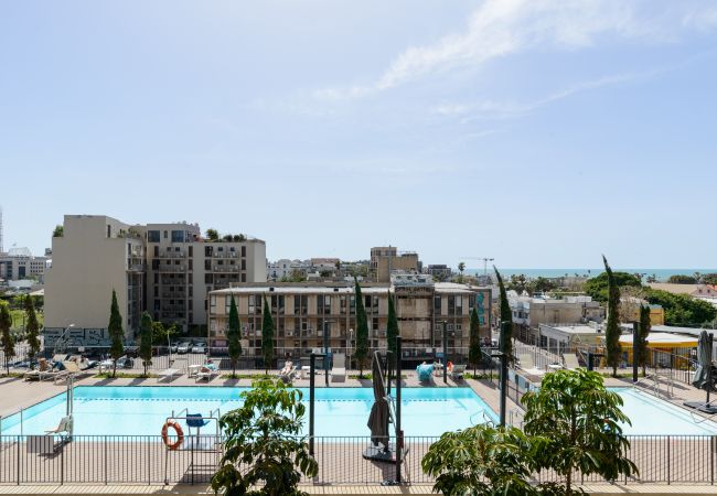 Apartamento em Tel Aviv - Jaffa - MAMAD Bright & Chic Condo with Pool & Unique View by FeelHome Apartamento em Tel Aviv - Jaffa - MAMAD Bright & Chic Condo with Pool & Unique View by FeelHome