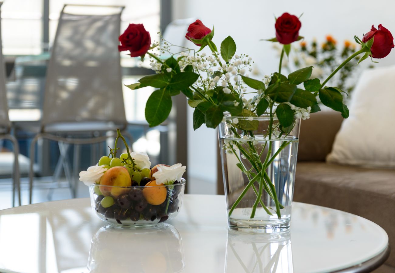 Home decor in Tel Aviv apartment  Gorgeous flowers and fruit basket on Ben Yehuda st.